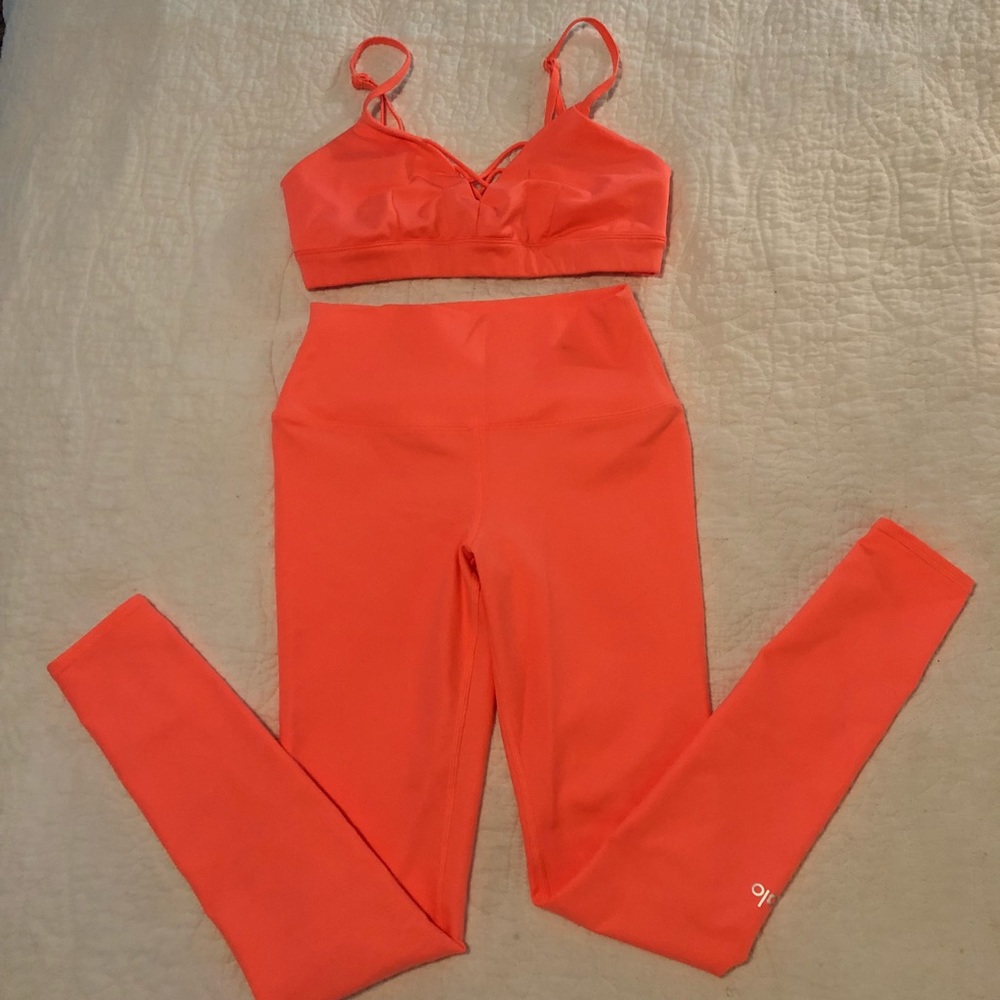 ALO Yoga leggings and bra set in orange sherbet